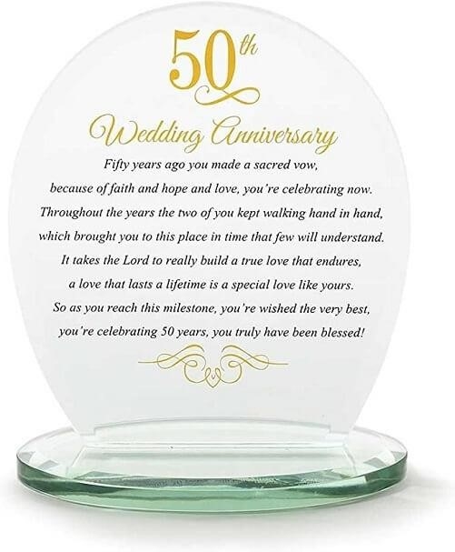 The plaque for Dickson's 50th wedding anniversary features a yellow glass table top sign.