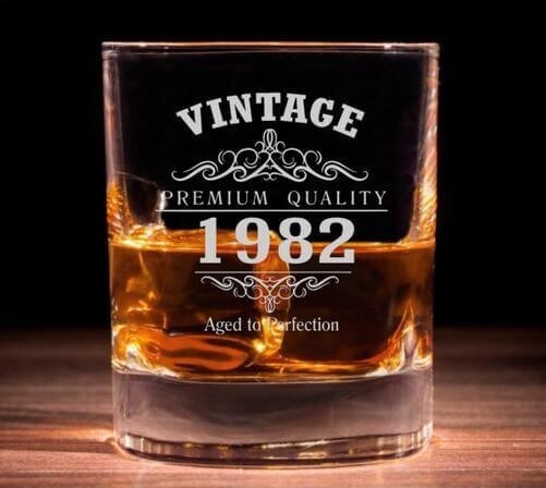 The perfect present for a husband's 40th birthday is an engraved whiskey glass from 1982.